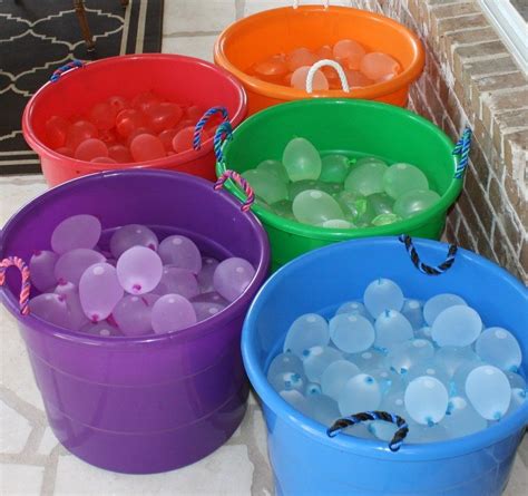 Water Balloons for a summer party! Tubs are strategically placed ...