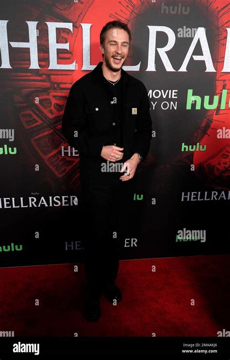 Drew Starkey poses at a special screening of the Hulu reboot of ...