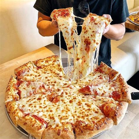 A mad cheese pizza pull! : r/FoodPorn