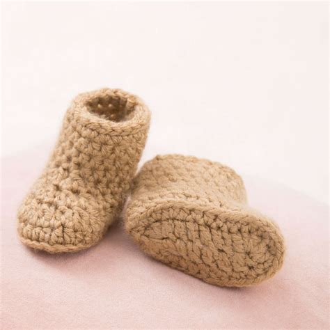 Free Experienced Red Heart Warm Baby Boots Crochet Pattern | Yarnspirations