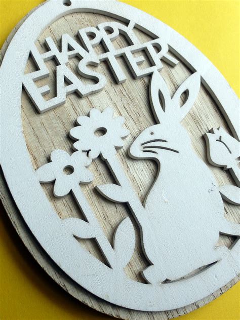 Easter bunny woodcraft pendant in close-up Creative Commons Stock Image
