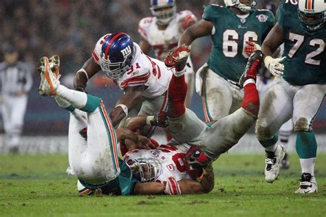 SI's Best Photos of Michael Strahan - Sports Illustrated