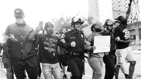 Protesters, police link arms to march from Austin PD headquarters to ...