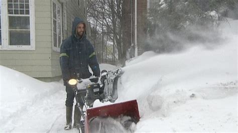 New Brunswick weather: Snowstorm closes schools, slows travel | CBC News