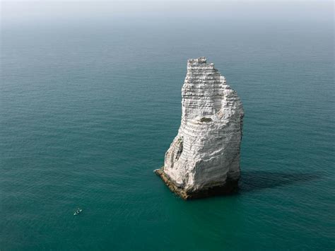 White Rock Formation in Middle of Sea · Free Stock Photo