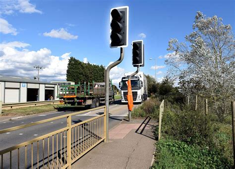 Families 'taking lives in their hands after A47 crossing lights damage ...