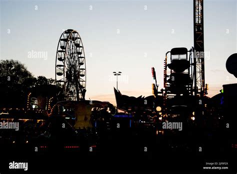 Fairground rides at night Stock Photo - Alamy