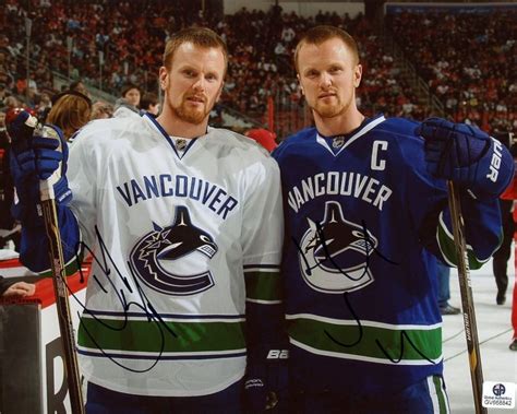 Daniel Sedin & Henrik Sedin Signed Canucks 8x10 Photo (GA COA)