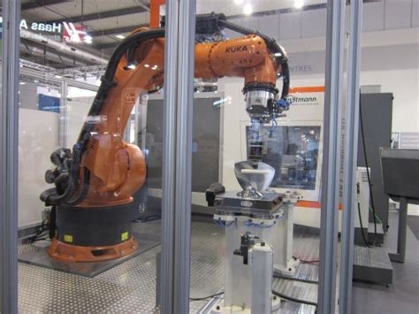 Integrating Robot Programming into the CNC: One Example: Modern Machine Shop