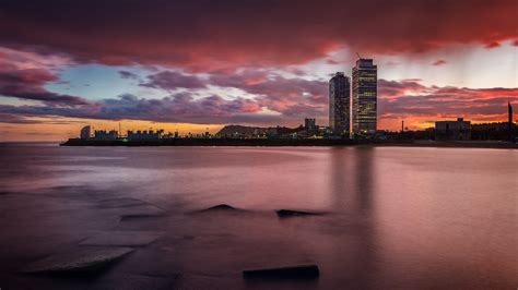 Barcelona skyline at sunset - backiee