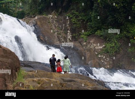 Group admiring the Sathmala Falls on the Gin River, Sathmala, Southern ...