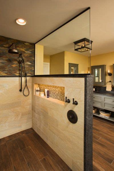 This spacious walk-in shower feels like its own room thanks to the single stair entry and ...