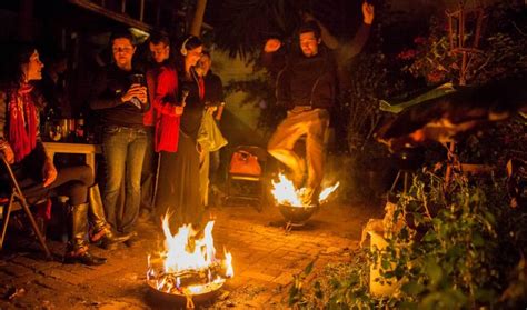 Celebrating Charshanbe Suri (Čāršanbe Suri, "Red Wednesday") by jumping ...