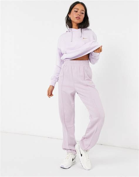 Nike mini metallic swoosh oversized purple joggers - ShopStyle ...