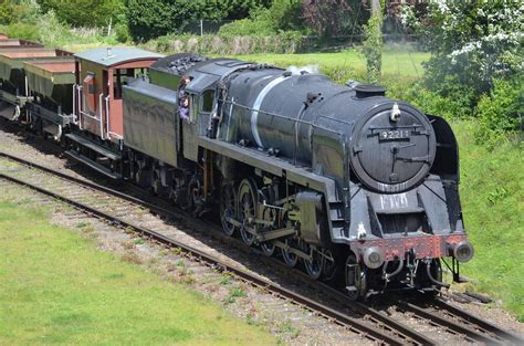 Locomotive #92214, of Britain's last class of steam locomotives, "9F," operates with a ...