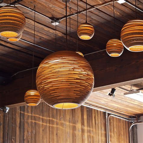 Spotlight: Graypants | Design Necessities Lighting | Moon pendant light ...