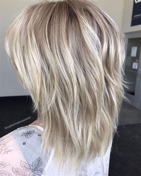 Sliced Ash Blonde Shag | Medium length hair cuts, Modern shag haircut ...