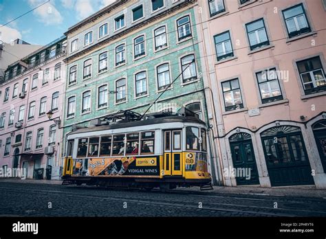 Old tram through the streets of beautiful Lisbon Stock Photo - Alamy