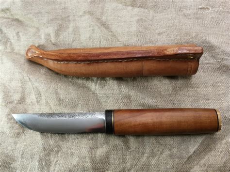 Just finished this yakut knife and sheath. Forged the blade quite some time ago : r/Bladesmith