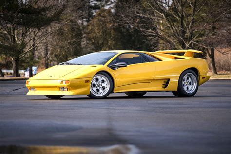 Download Yellow Car Car Lamborghini Supercar Vehicle Lamborghini Diablo 4k Ultra HD Wallpaper