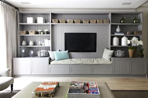 projection screen surrounded by bookshelves | Living room wall units, Living room built ins ...