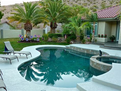 Desert Landscape with pool house in back. | Pools backyard inground, Backyard, Backyard pool designs