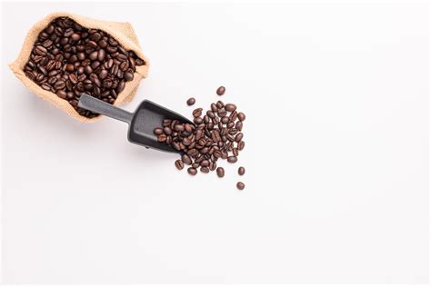 coffee beans white background scene 3125359 Stock Photo at Vecteezy