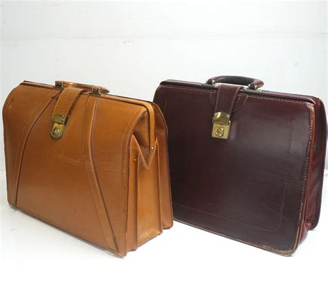 Two Vintage Leather Briefcases - Lot 1054973 | ALLBIDS