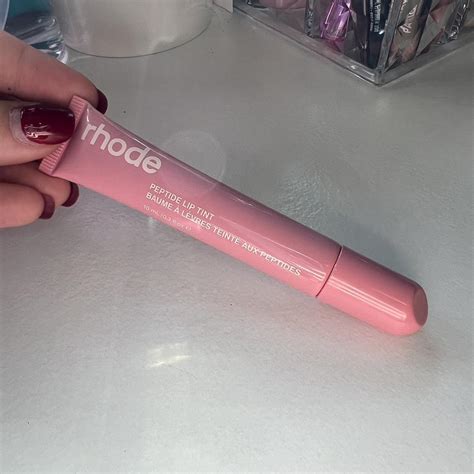 rhode peptide lip tint in “ribbon” never worn, only... - Depop