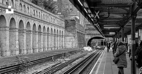 A black and white photo of a train station photo – Free United kingdom Image on Unsplash