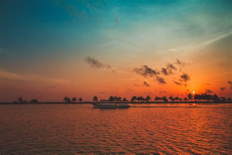 Sunset Cruise - Sunset over the island - Maldives | Scenic travel, Visit maldives, Sunset cruise