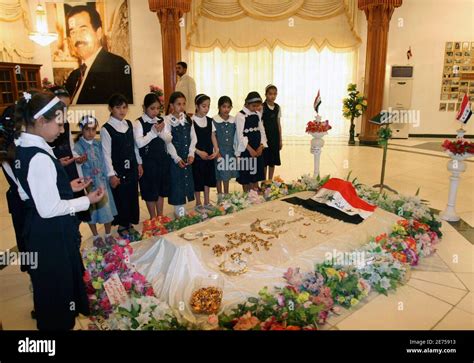 School children visit the grave of Iraq's late former president Saddam Hussein on the ...