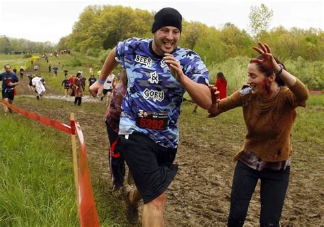 Zombies chase runners during "Run for Your Lives" 5k race | Fitness ...