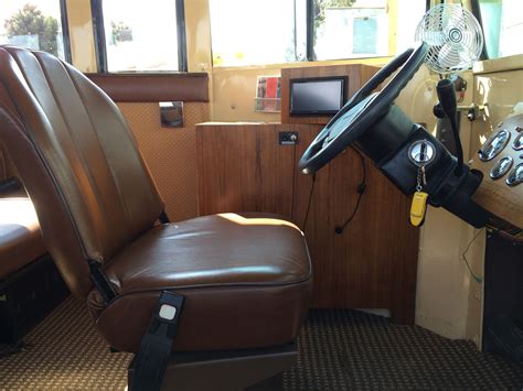 Original driver seat reupholstered . | Short bus, School bus conversion ...