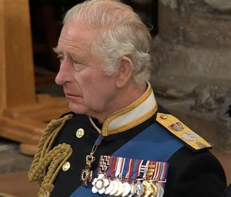 King Charles III appears tearful at the funeral of his mother Queen ...