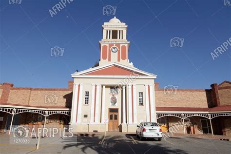 AFRIPICS - Government building with a car parked outside of it in Wolmaransstad