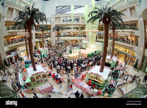 Raffles City shopping mall Singapore Stock Photo - Alamy