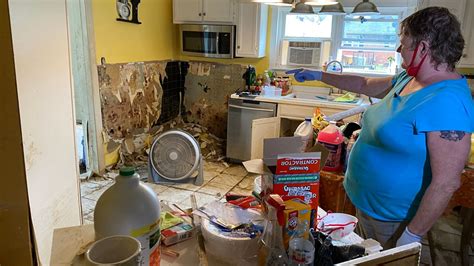 Kentucky resident cleaning up home devastated in flood