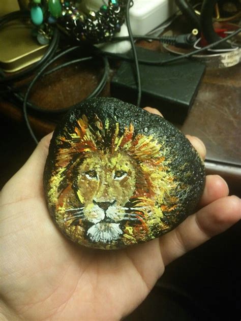 First lion rock painting | Lion rock painting, Lion rock, Painted rocks