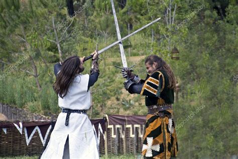 Medieval knights fighting to the death with swords — Stock Photo © James633 #6888576