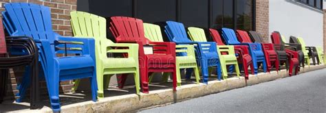 Colorful Adirondack Chairs stock image. Image of lawn - 119165257