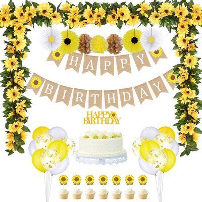 a happy birthday banner with sunflowers and cupcakes