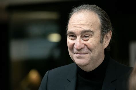 Tycoon Xavier Niel says he was spy who hacked ex-French president