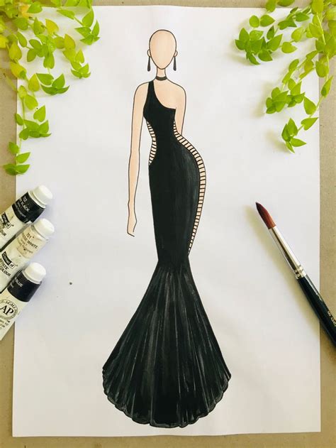 a drawing of a woman in a black dress with green leaves around her and ...