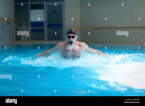 Swimmer Doing Butterfly Stroke Stock Photo - Alamy