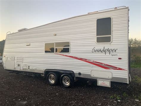 2006 SANDPIPER 25FT TOY HAULER BUMPER PULL TRAVEL TRAILER WITH GEN LOOK SGREAT for Sale in ...