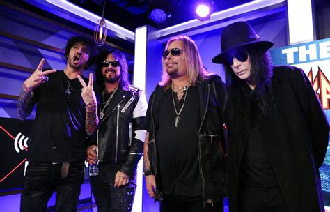 Motley Crue guitarist files lawsuit against bandmates, report says ...