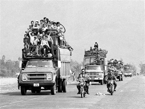 Vietnam War - Fall of Saigon | Trucks and motorbikes, loaded… | Flickr
