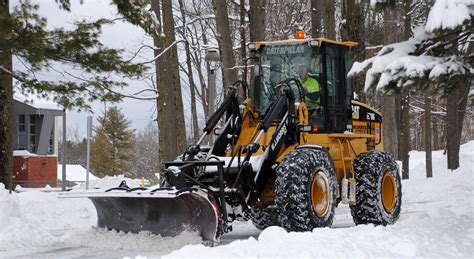 CAT IT28G plowing snow #CatMachines