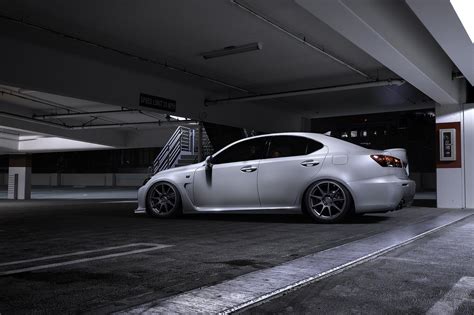 a silver car parked in a parking garage